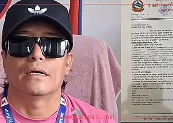 Rajkumar Shaky, Chief Administrative Officer, sitting in front of a Chulachuli Gaupalika office backdrop, looking serious while wearing a pink shirt, black Adidas cap, and sunglasses, with a letter in Nepali on the right side of the image.